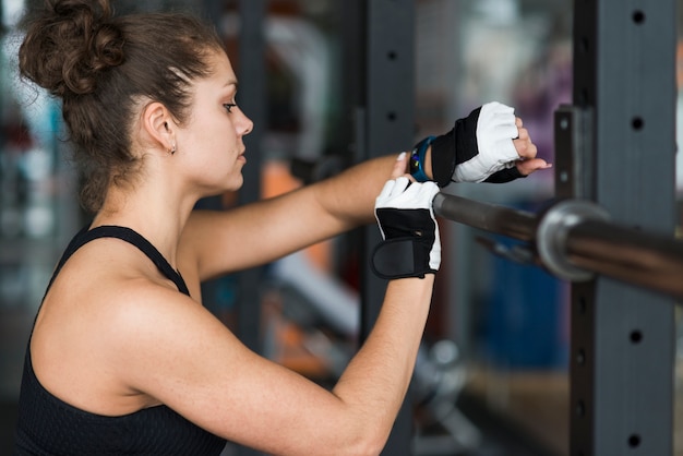 Sporty woman using smartwatch