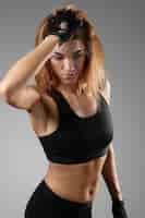 Free photo sporty woman working out