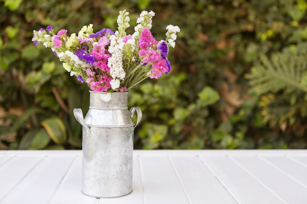 Free Photo spring background with metallic vase