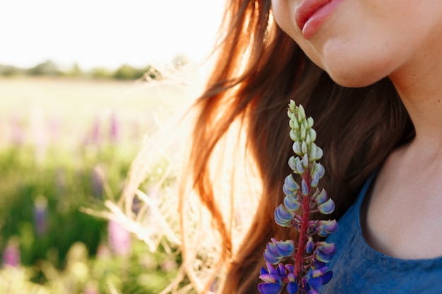 Free Photo spring fashion girl face outdoors portrait in blooming field. 