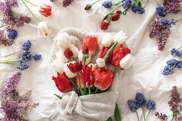 Free photo spring flower composition on a white background top view