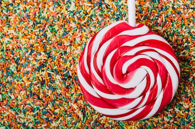 Free photo sprinkles and lollipop