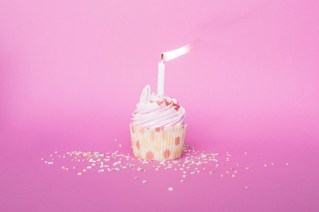 Free photo sprinkles near birthday cupcake