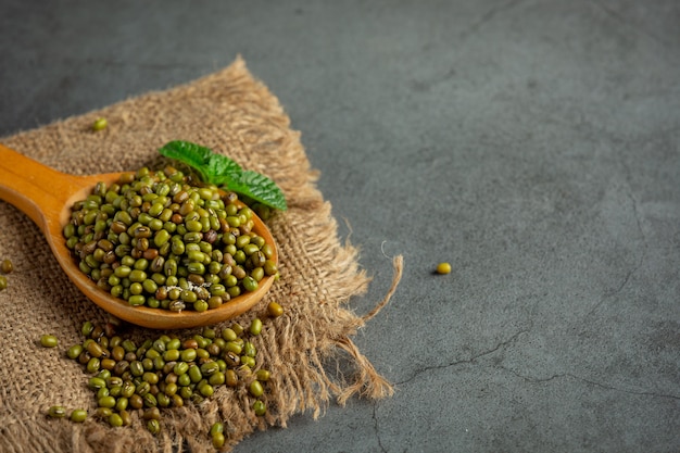 Free photo sprouts seed in wooden spoon