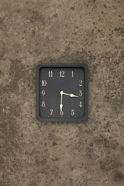 Square clock outdoors still life