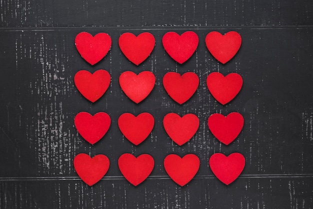 Free Photo square from hearts on dark background