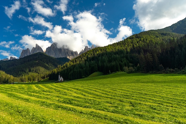 Free Photo st. magdalena church, villnoss valley, south tyrol, italy with puez geisler group dolomites