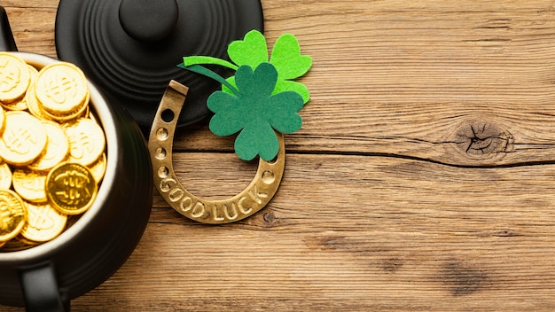 St patrick items on wooden table top view