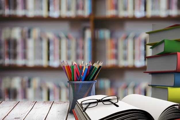 Free Photo stack of books with glasses on wooden desk