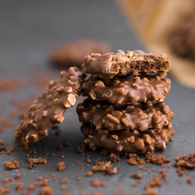 Free photo stack of chocolate cookies with nuts