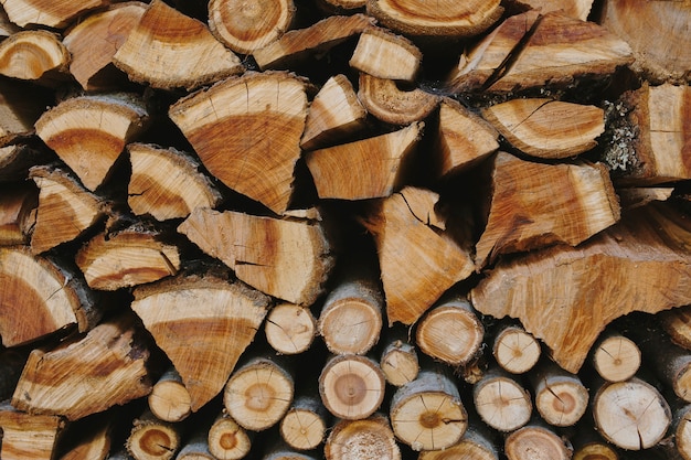 Stack of firewood textured background