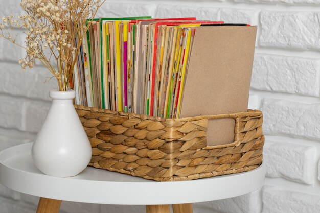 Free Photo stack of old coming book strips in box on coffee table