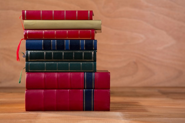 Stack of various books on a table