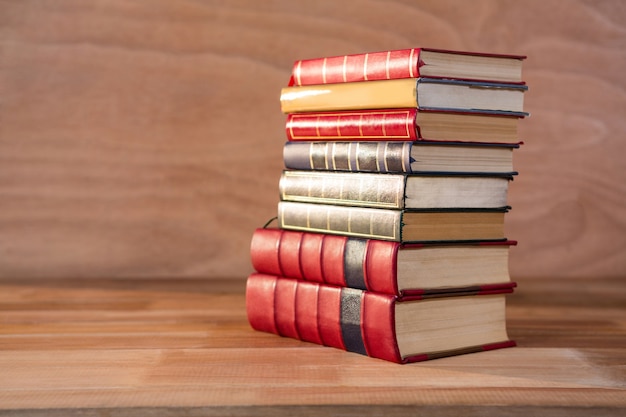 Stack of various books on a table