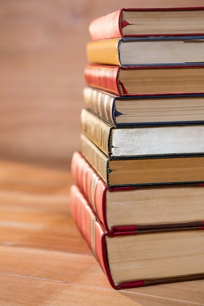 Stack of various books on a table