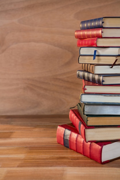 Stack of various books on a table