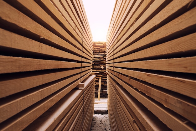 Free Photo stack of wooden planks in sawmill lumber yard