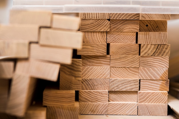 Free photo stack of wooden planks in the workshop