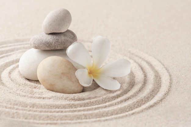 Free Photo stacked zen stones sand background art of balance concept