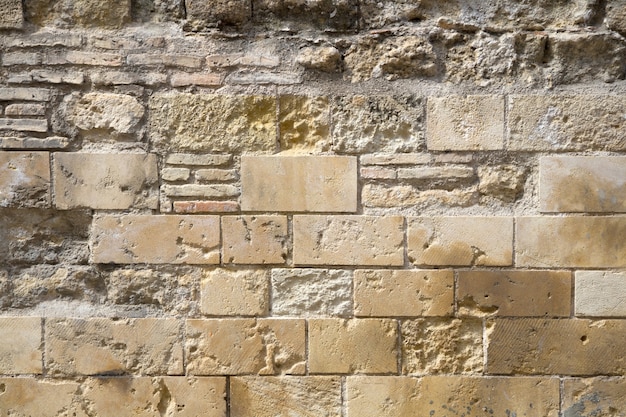 Free photo stained brick blocks in wall