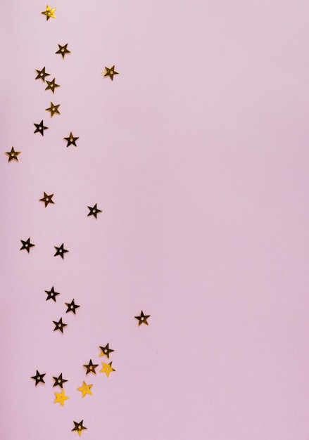 Free photo star golden sequins with copy space