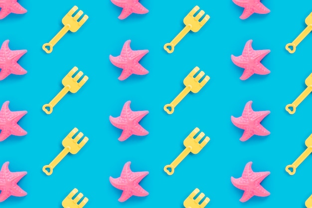 Free photo starfish and shovel pattern