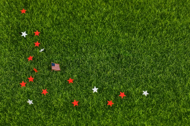 Stars and flag in grass