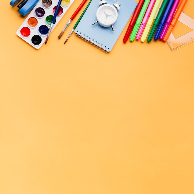 Stationery on orange background