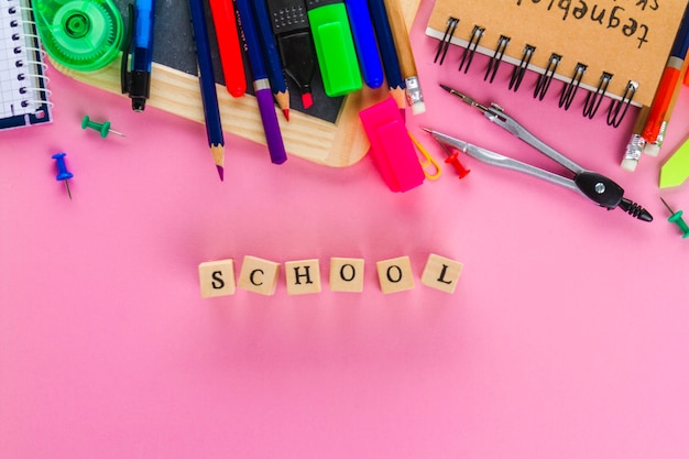 Free photo stationery for school time on pink