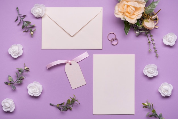 Free Photo stationery wedding invitation with flowers