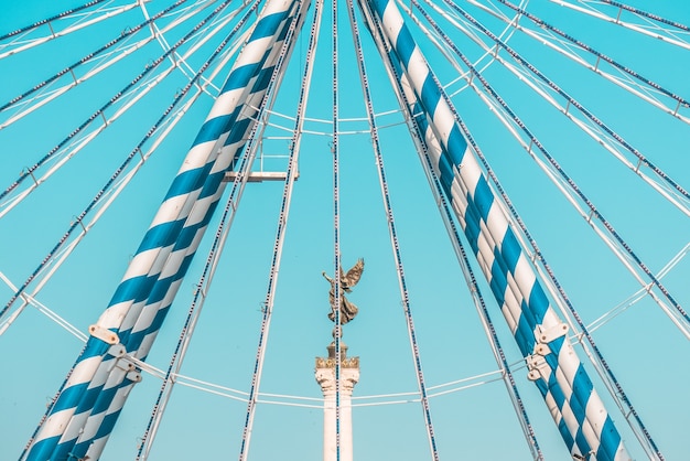 Free Photo statue on pedestal and blue sky