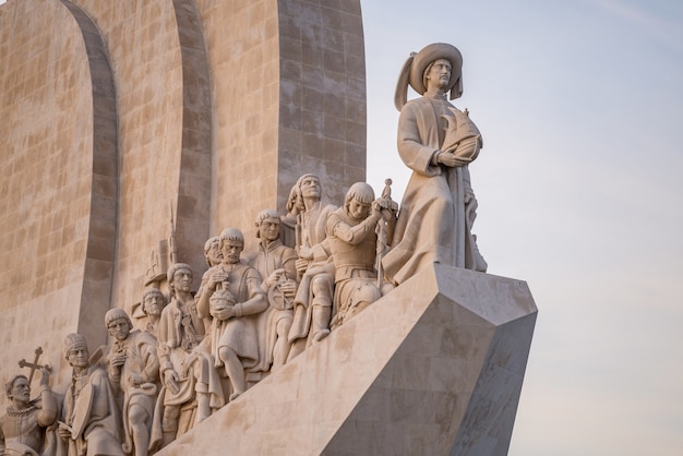 Free photo statues on the monument of discoveries under the sunlight in lisbon in portugal