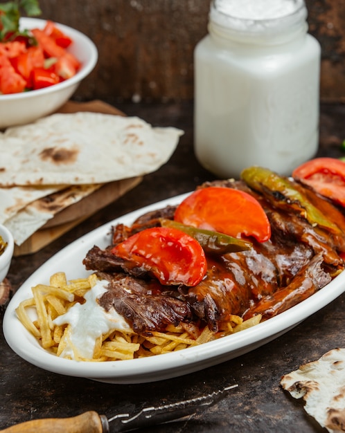 Steak with and fresh tomato and pepper