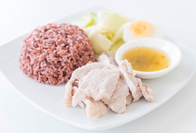 Steamed pork with spicy sauce and lemon with berry rice