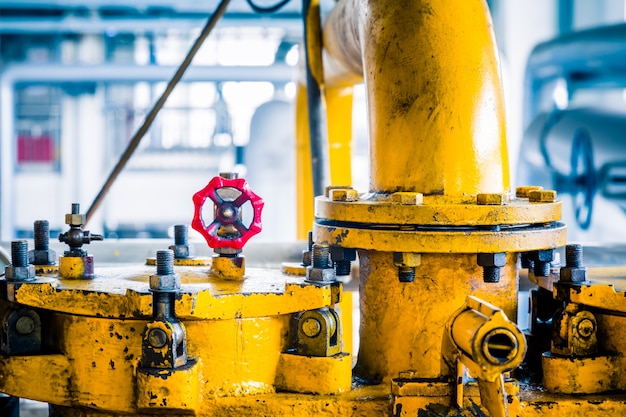 Free photo steel pipelines and cables in a plant