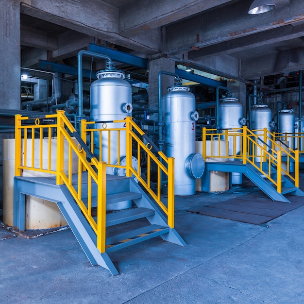 Free photo steel pipelines and cables in a plant