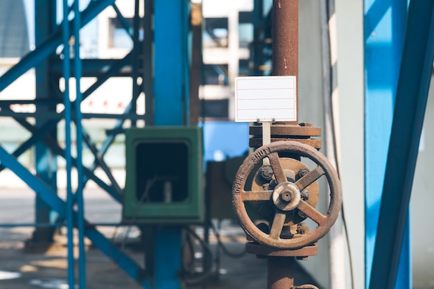 Free Photo steel pipelines and cables in a plant