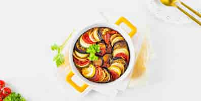 Free photo step 5 different vegetables a healthy diet ingredients for baking vegetable ratatouille on a white background top view