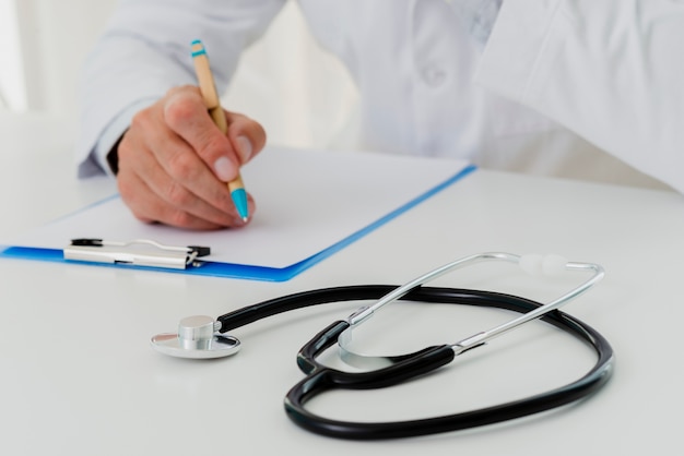 Stethoscope on desk defocused