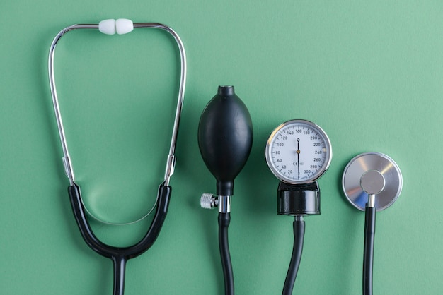 Stethoscope lying near sphygmomanometer