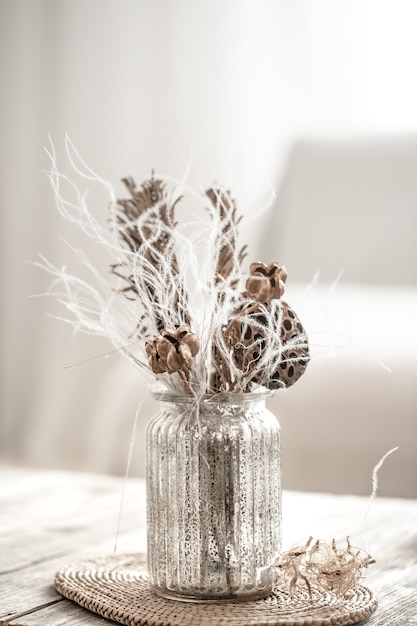 Free photo still life beautiful vase with dried flowers .