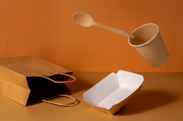 Free photo still life of cardboard organic dinnerware