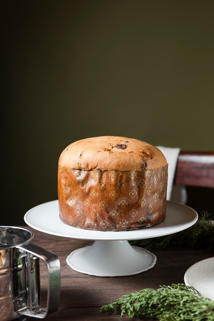 Still life composition of delicious panettone with copy space