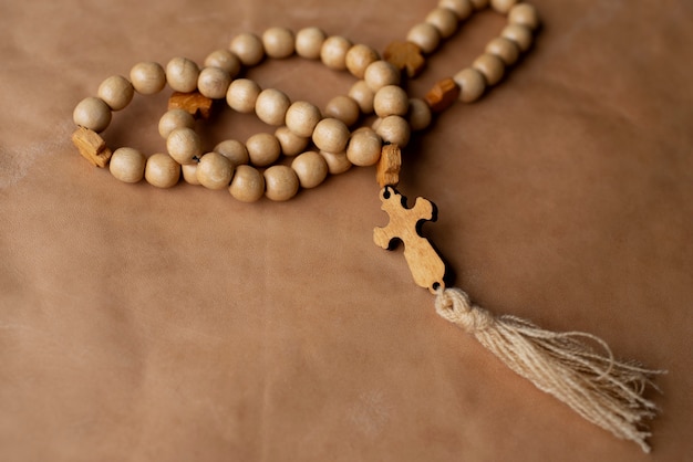 Still life of crucifix with beads