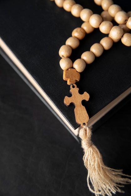 Still life of crucifix with book