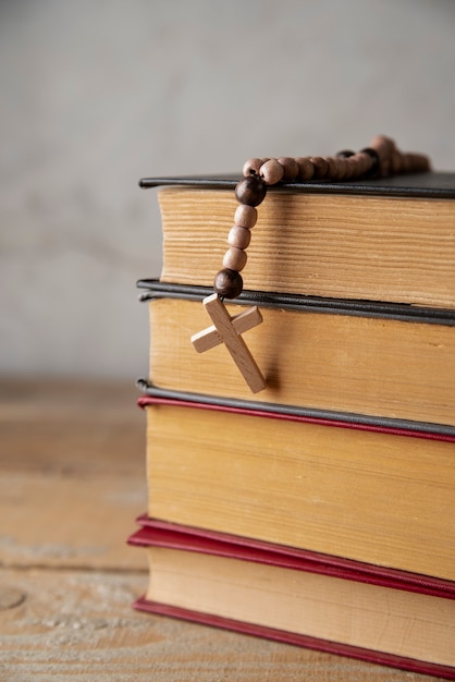 Still life of crucifix with book