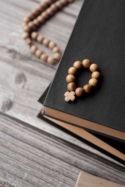 Free photo still life of crucifix with book