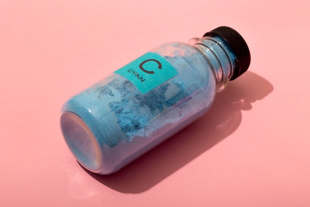 Still life cyan toner arrangement isolated