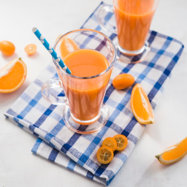 Free photo still life of delicious orange smoothie