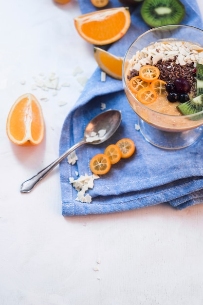 Free photo still life of delicious orange smoothie